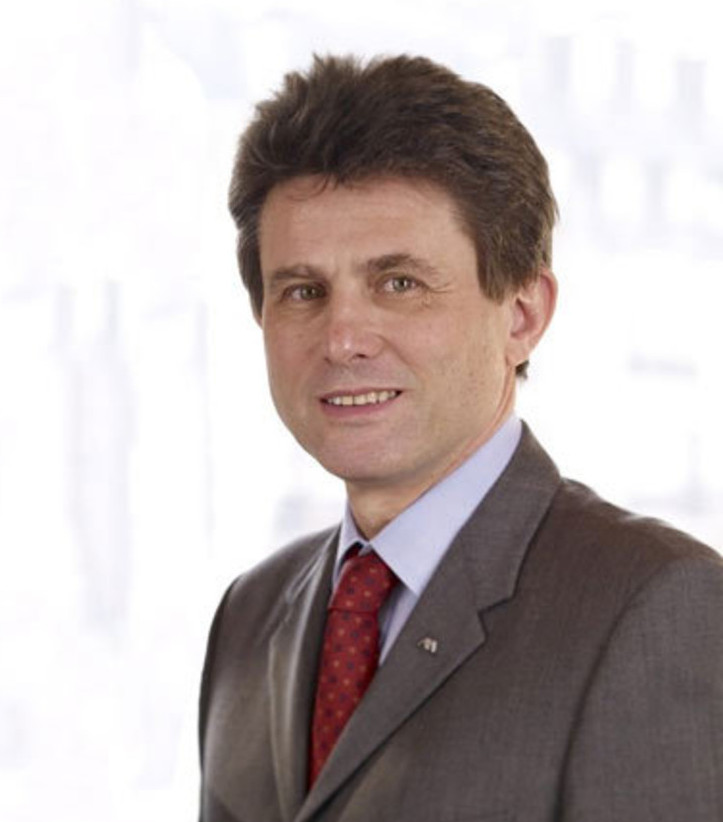 AXA chief to step down, in frame for HSBC role